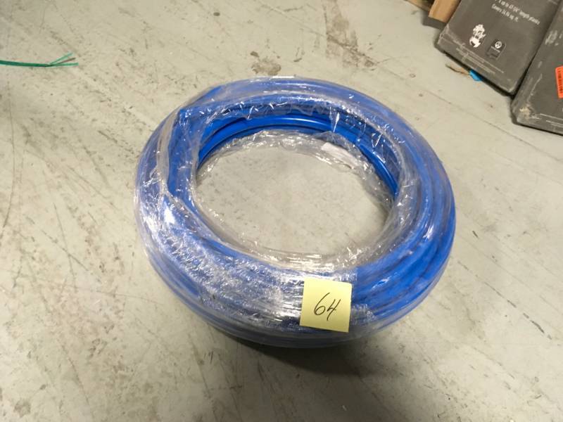 lot 64 image: SharkBite 34 in. x 100 ft. Coil Blue PEX Pipe not used