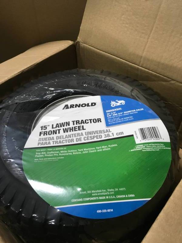 lot 16 image: Arnold 15 in. Universal Front-Rider Wheel for Lawn Tractors  in good condition