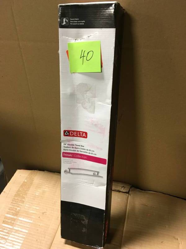 lot 40 image: Delta Trinsic 24 in. Double Towel Bar in Chrome in good condition