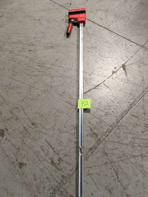 lot 92 image: BESSEY 50 in. K-Body REVOlution (KRE) Parallel Clamp with Composite Plastic Handle and 3-34 in. Throat Depth in good condition