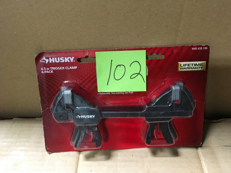 lot 102 image: Husky 4.5 in. Micro Trigger Clamp Set (4-Piece) in good condition