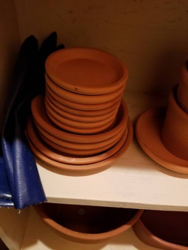 lot 56 image: Collection of Terra Cotta and Plastic Planters