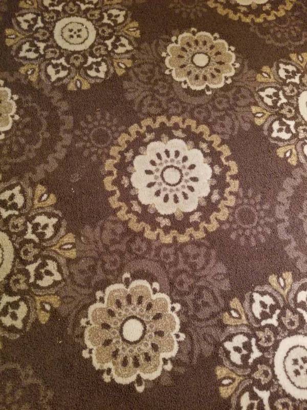 lot 26 image: Warm Brown Area Rug