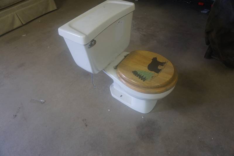 lot 97 image: Ceramic Toilet With Outdoor Bear Themed Seat