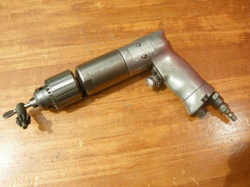 lot 80 image: Central Pneumatic 12 Air Drill