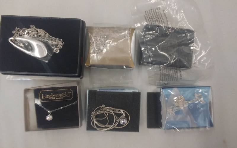 lot 22 image: 6-Avon Silvertone Necklaces Amethyst Pendant & 5 Other- 2 With Large CZs