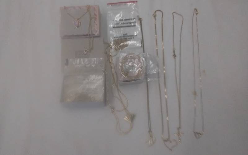 lot 23 image: 9-Assorted Gold Tone Necklaces Most Avon