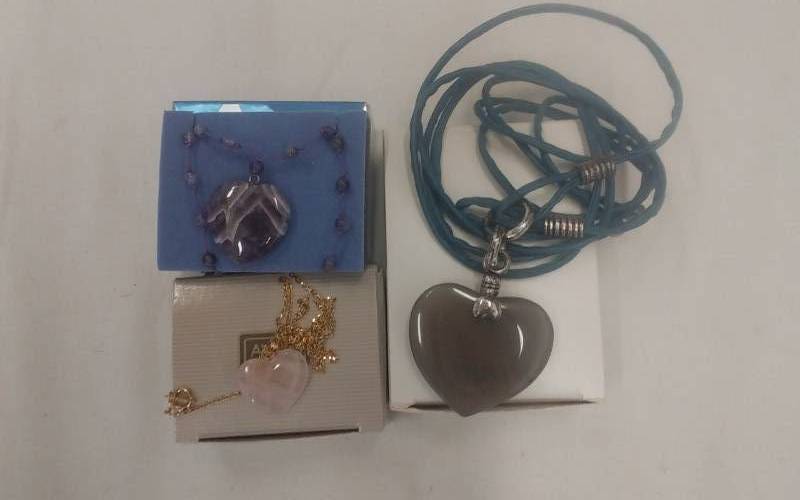 lot 25 image: 3-Avon Polished Stone Pendants