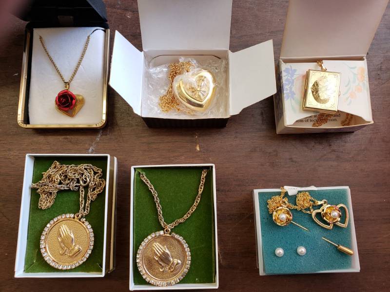 lot 35 image: 2-Locket Pendants, 2-Prayer Pendants, 2 Other Necklaces All Gold Tone