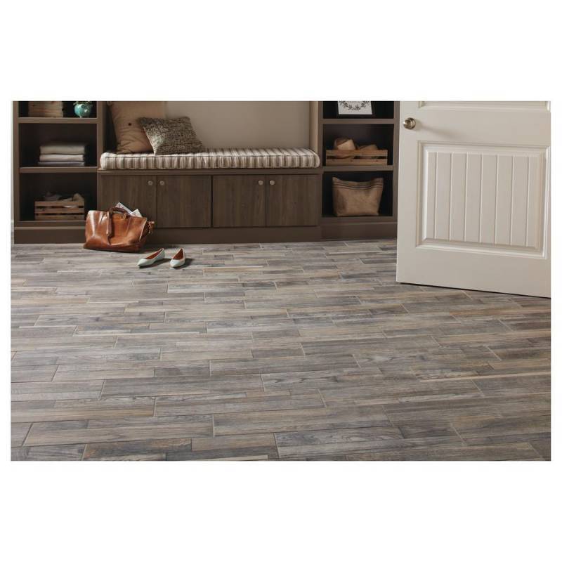 lot 11 image: LifeProof Pewter Wood 6 in. x 24 in. Glazed Porcelain Floor and Wall Tile (14.55 sq. ft.  case) - 27 cases