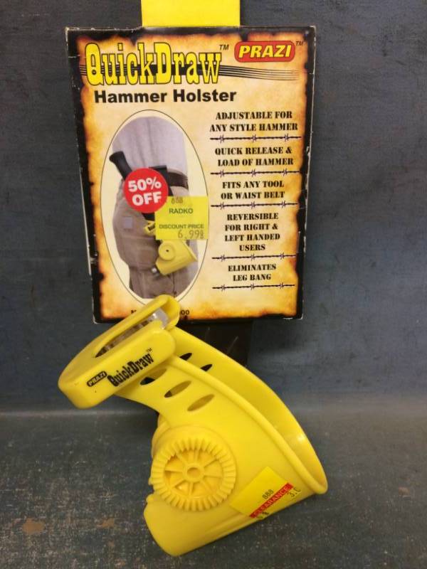 lot 24 image: Plastic Caution Signs, Hammer Holsters and More