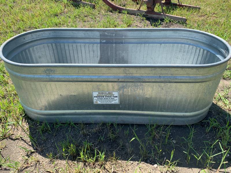 lot 6 image: Behlen Round End 169 Gallon Stock Tank