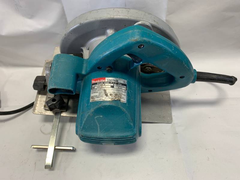 lot 12 image: Makita 7 14 Professional Circular Saw (works great)