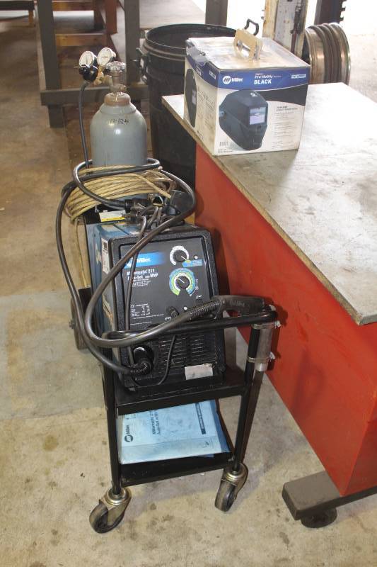 lot 46 image: Miller Miller-Matic 211 Auto-Set with MVP 120230V Wire Feed Welder, Digital Pro-Hobby Series Black Welder Mask