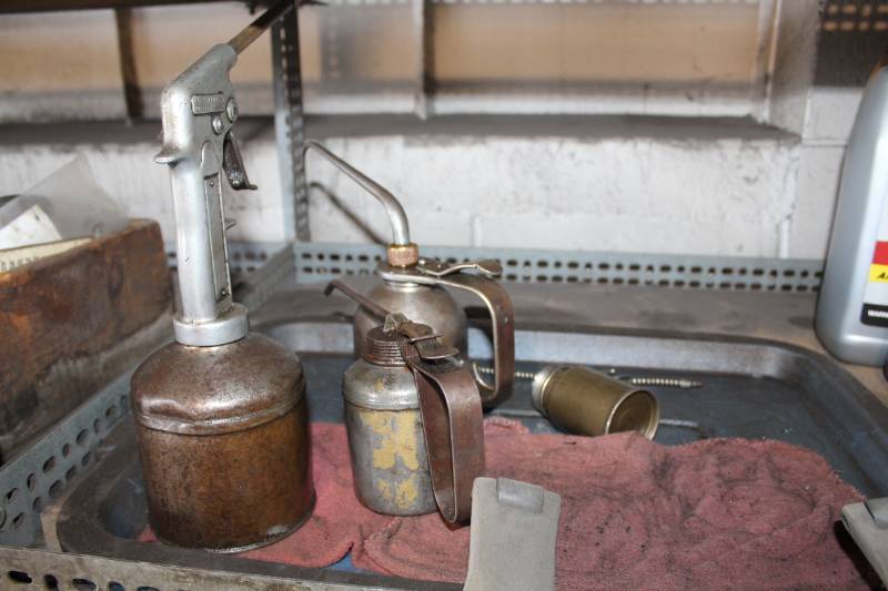 lot 173 image: Lot of (4) Oil CansDispensers, Box of Oil Cans