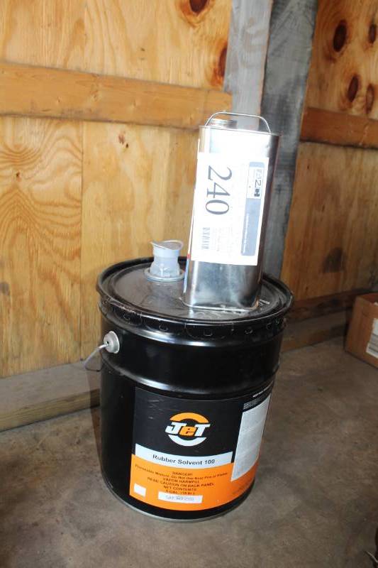 lot 240 image: Jet Rubber Solvent 100 5-Gallon, Patch Rubber Company Fiber Bond Brush Type Cement 1-Gallon