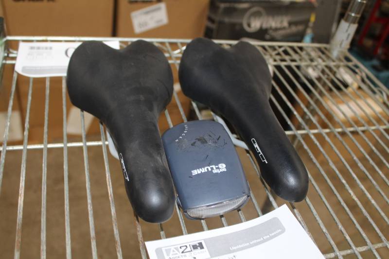 lot 198 image: Lot of (3) 2-GT Bicycle Seats, 1-E-lume Light