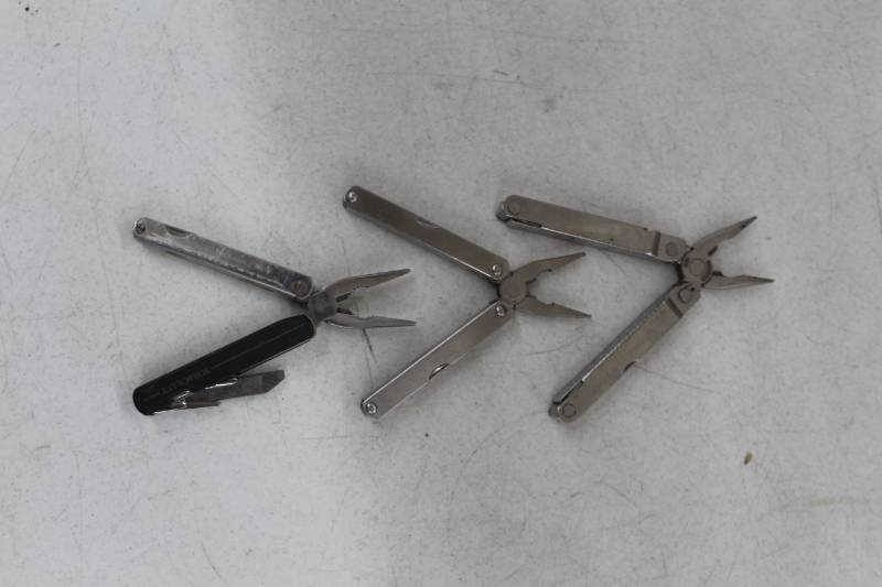 lot 196 image: Lot of (3) Folding Multi-Tools
