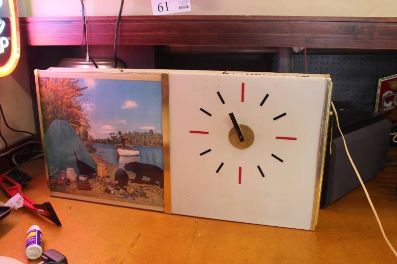 lot 12 image: Hamms Lake Wall Clock with Our Factory Trained Technicians Pako Products Signage