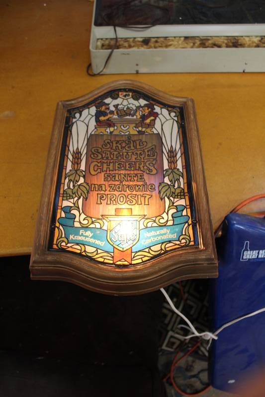 lot 25 image: Old Style SkolSaluteCheersSanteNa ZdrowieProsit Lighted Wall Dcor