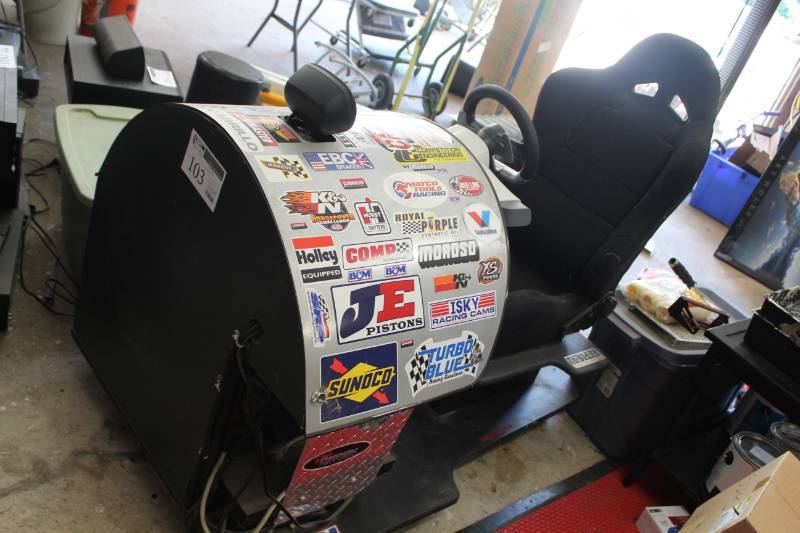 lot 103 image: The Racing Game Seated Video Arcade Game with Racing Seat, Steering Wheel, Display and Stand