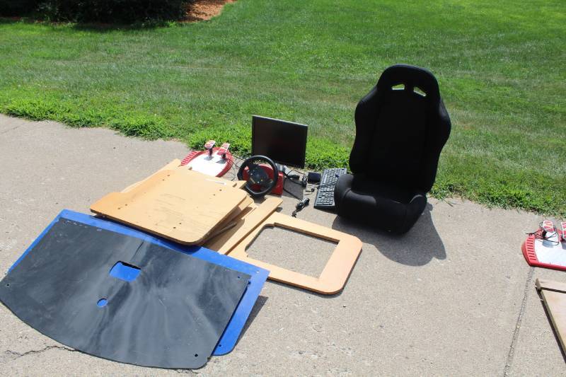 lot 104 image: The Racing Game Seated Video Arcade Game with Racing Seat, Steering Wheel, Display and Stand