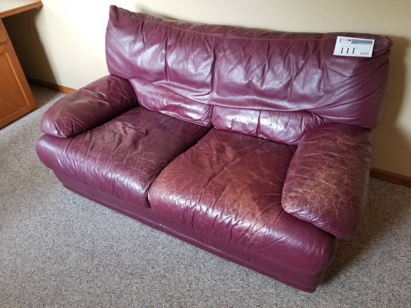lot 111 image: Leather Sofa and Love Seat