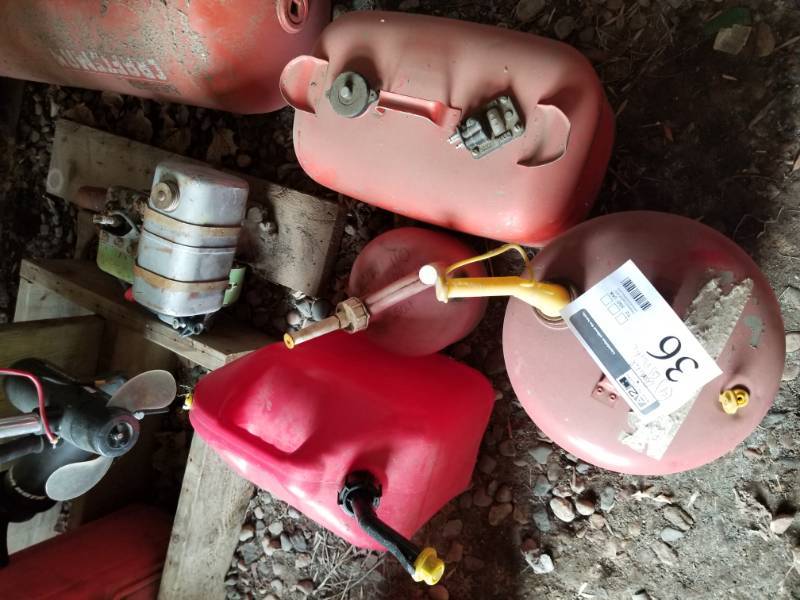 lot 85 image: Lot of (4) Metal Boat Gas Can, Metal Gas Can, Plastic Gas Cans