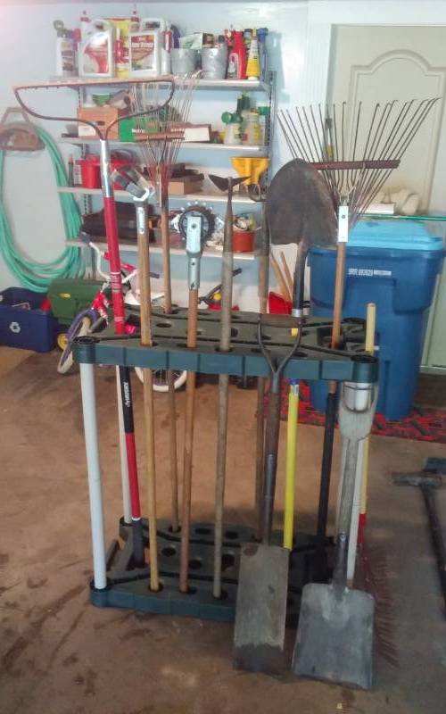 lot 9 image: Implement Organizer Stand 36x18x36 With Hoes, Rakes Shovels, Edger