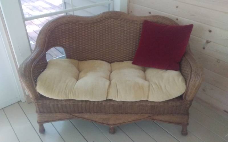 lot 97 image: Pier I Wicker Love Seat With Cushion 52-Inch