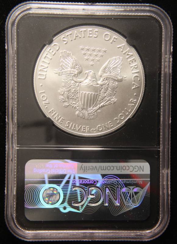 lot 12 image: 2019 AMERICAN SILVER EAGLE MS70 FIRST DAY OF ISSUE NGC BLACK JONES SIGNED