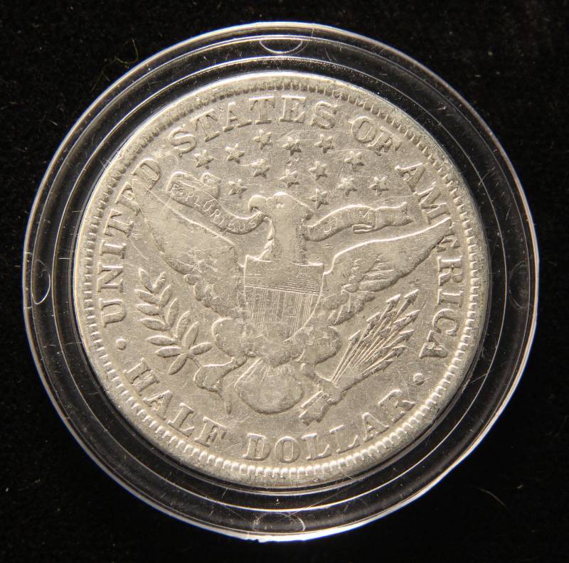 lot 37 image: 1897 BARBER SILVER HALF DOLLAR IN AIRTITE HOLDER