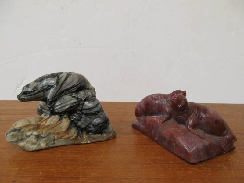 lot 64 image: Pair of Hand Carved Alaskan Stone Seal Sculptures - Jasper & Picasso Stone