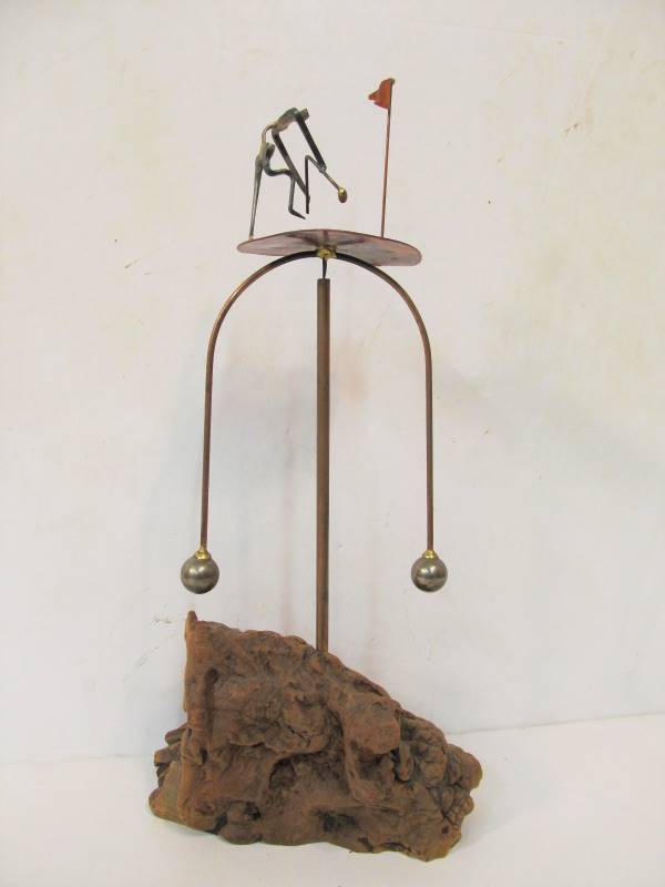 lot 116 image: Angry Golfer Balancing Toy on Burl Wood Base