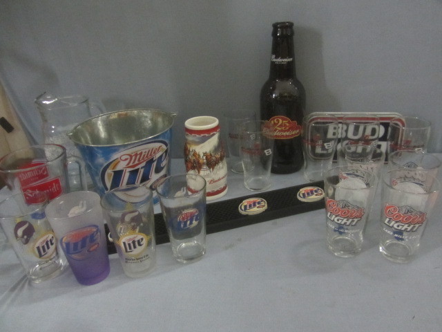 lot 83 image: Beer Pitcher, Glasses, Bottle,