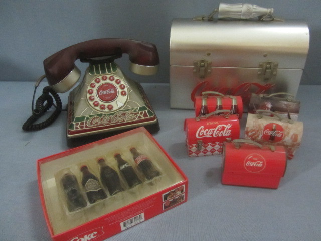 lot 46 image: Coke Phone, Lunch Boxes, Bottles