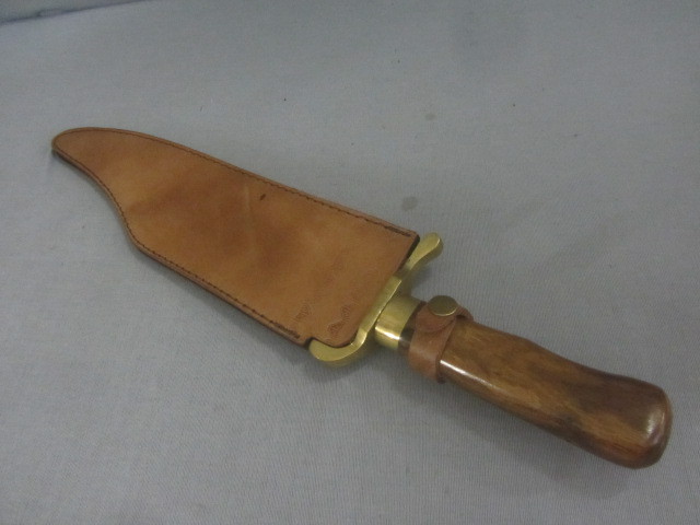 lot 18 image: Brass Backed Bowie Style Knife