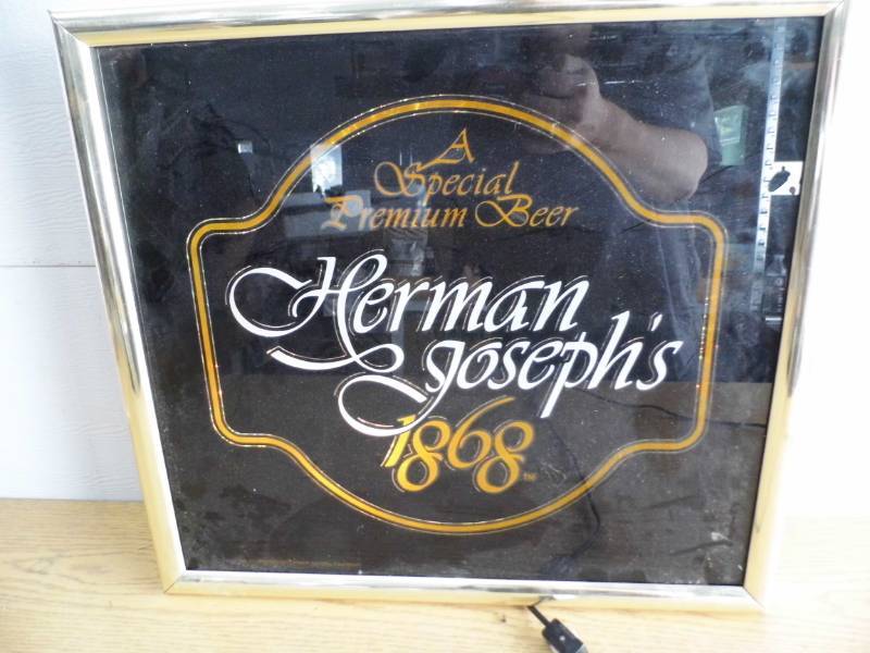 Herman Josephs Lit Sign
