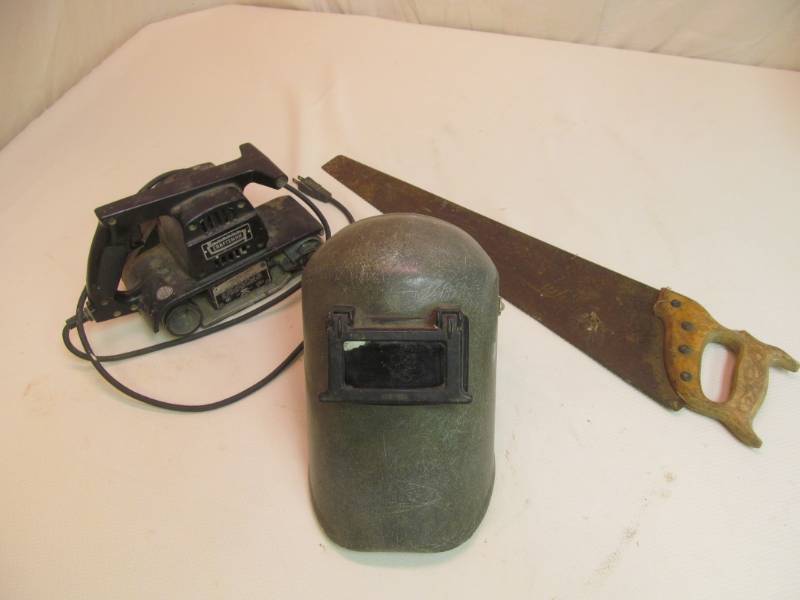 lot 42 image: Craftsman sander, welding helmet, hand saw