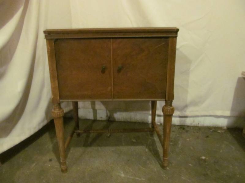 lot 65 image: vintage sewing machine cabinet