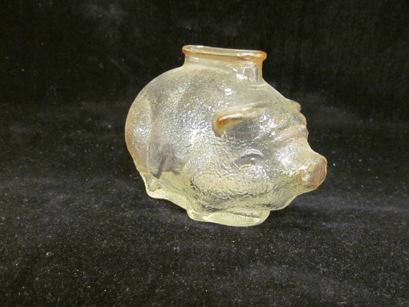 lot 83 image: Anchor Hocking coin bank