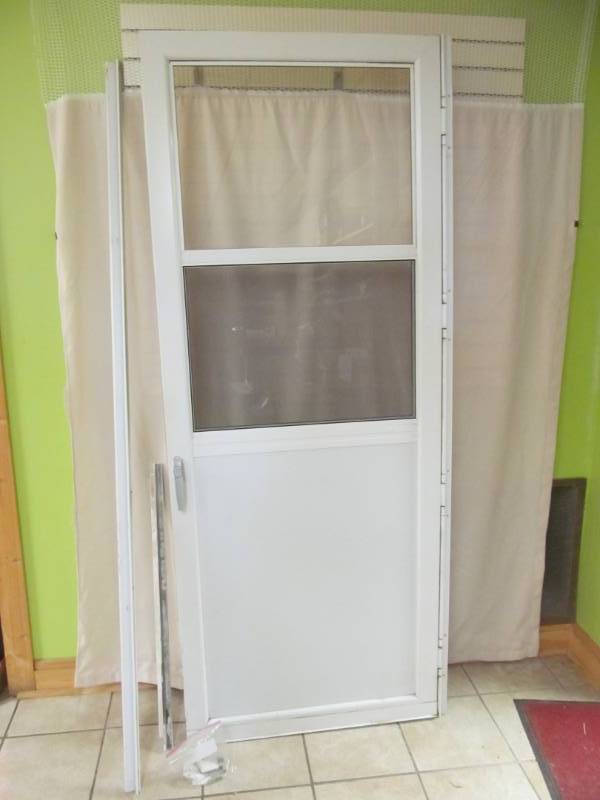 lot 112 image: metal storm door