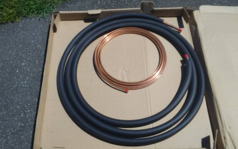 lot 46 image: 2- 25 Ft Rolls Copper Tubing 34 & 38