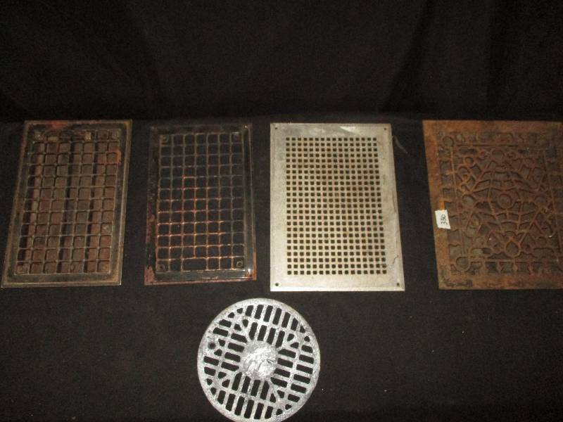 lot 16 image: 2 Steel 1 cast and 1 Aluminum Floor  Grate