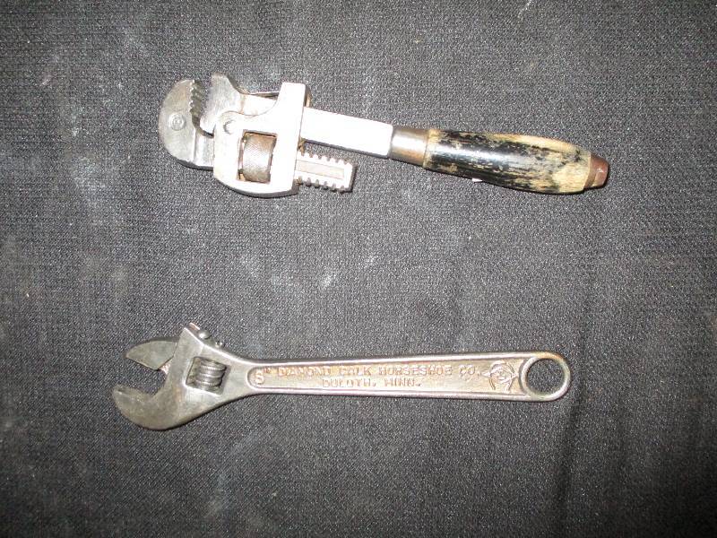 lot 37 image: 8 Stillson Pipe Wrench and 8 diamond cresent Wrench