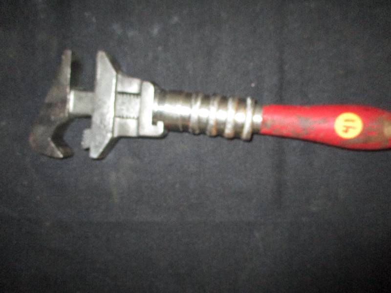 lot 41 image: 12 Bemis Monkey Wrench