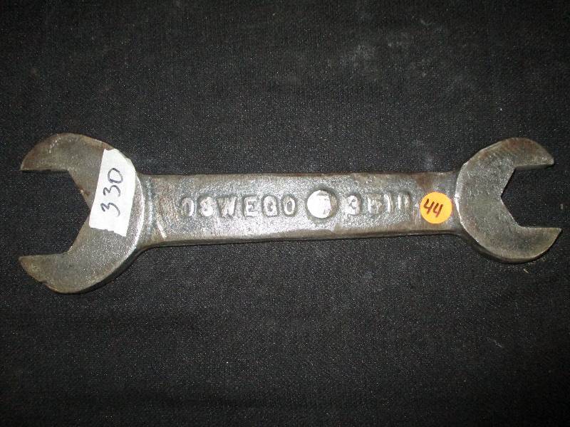 lot 44 image: 13 hand Forged Oswego Wrench they made one for each cutting machine very old