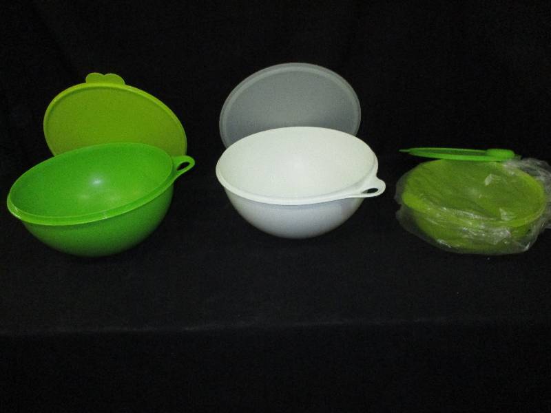 lot 58 image: Tupperware TWO 32 Cups and one a little smaller new unused
