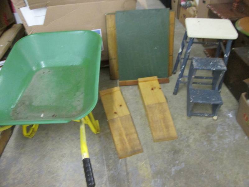 lot 2 image: Wheel Barrow with contents( step st...