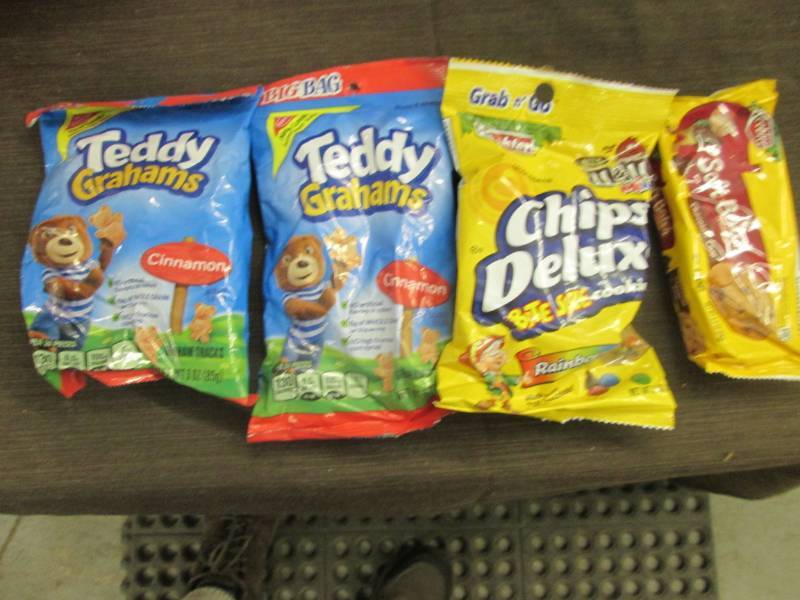 lot 39 image: 10- 3 oz pksTeddy Grahams plus 2 ot...